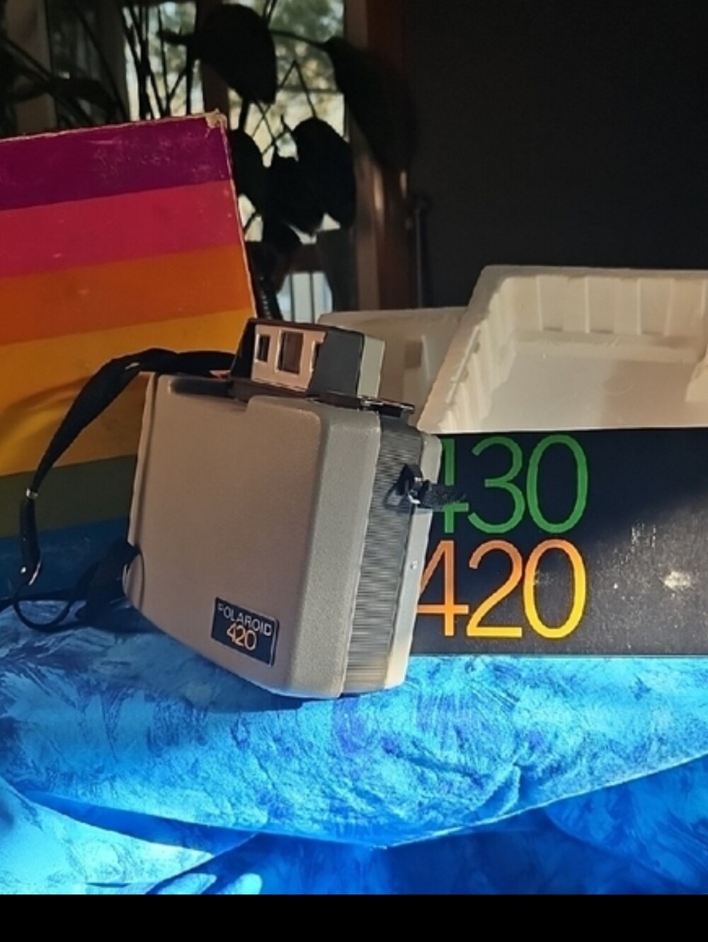 Polaroid Box with Navy Blue and Yellow Lettering